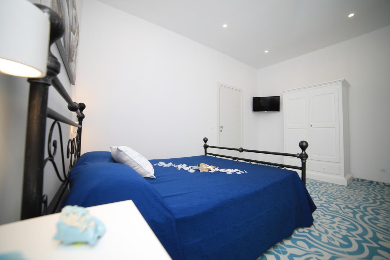 White Aurora Rooms Porto Cesareo Exterior photo