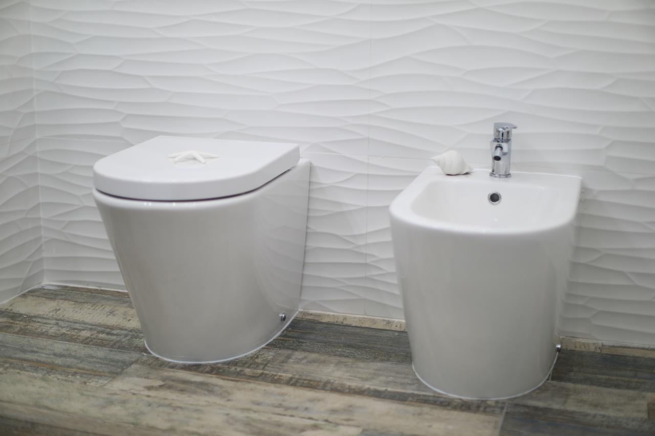 White Aurora Rooms Porto Cesareo Exterior photo